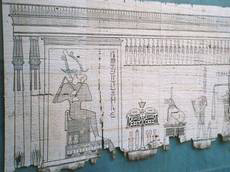 Egyptian papyrus showing god Osirus weighing human heart (image)